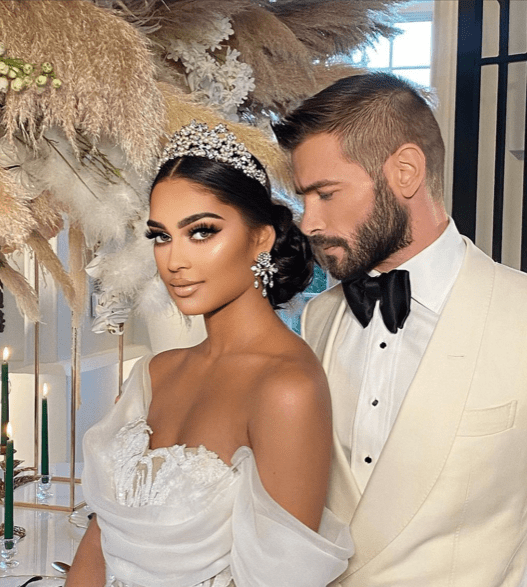 Bride with signature makeup look and groom